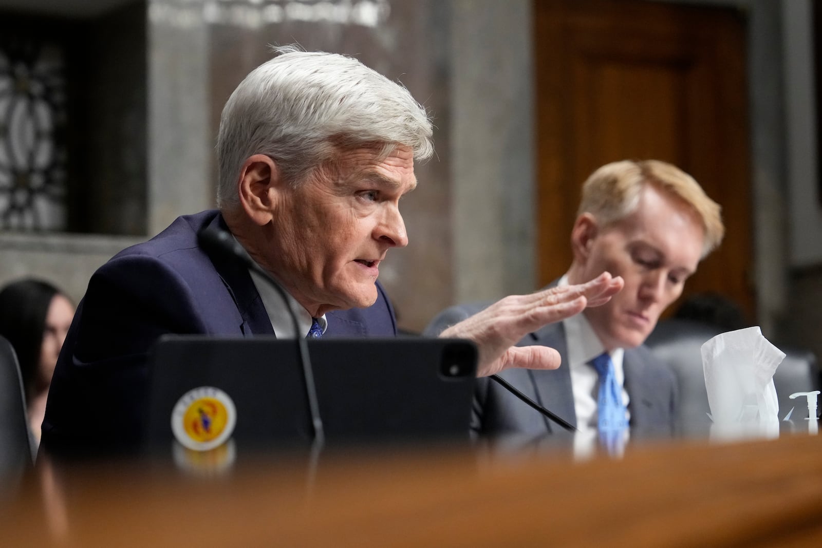 Sen. Bill Cassidy, R-La., questions Robert F. Kennedy Jr., President Donald Trump's choice to be Secretary of Health and Human Services, as he appears before the Senate Finance Committee for his confirmation hearing, at the Capitol in Washington, Wednesday, Jan. 29, 2025. (AP Photo/Ben Curtis)