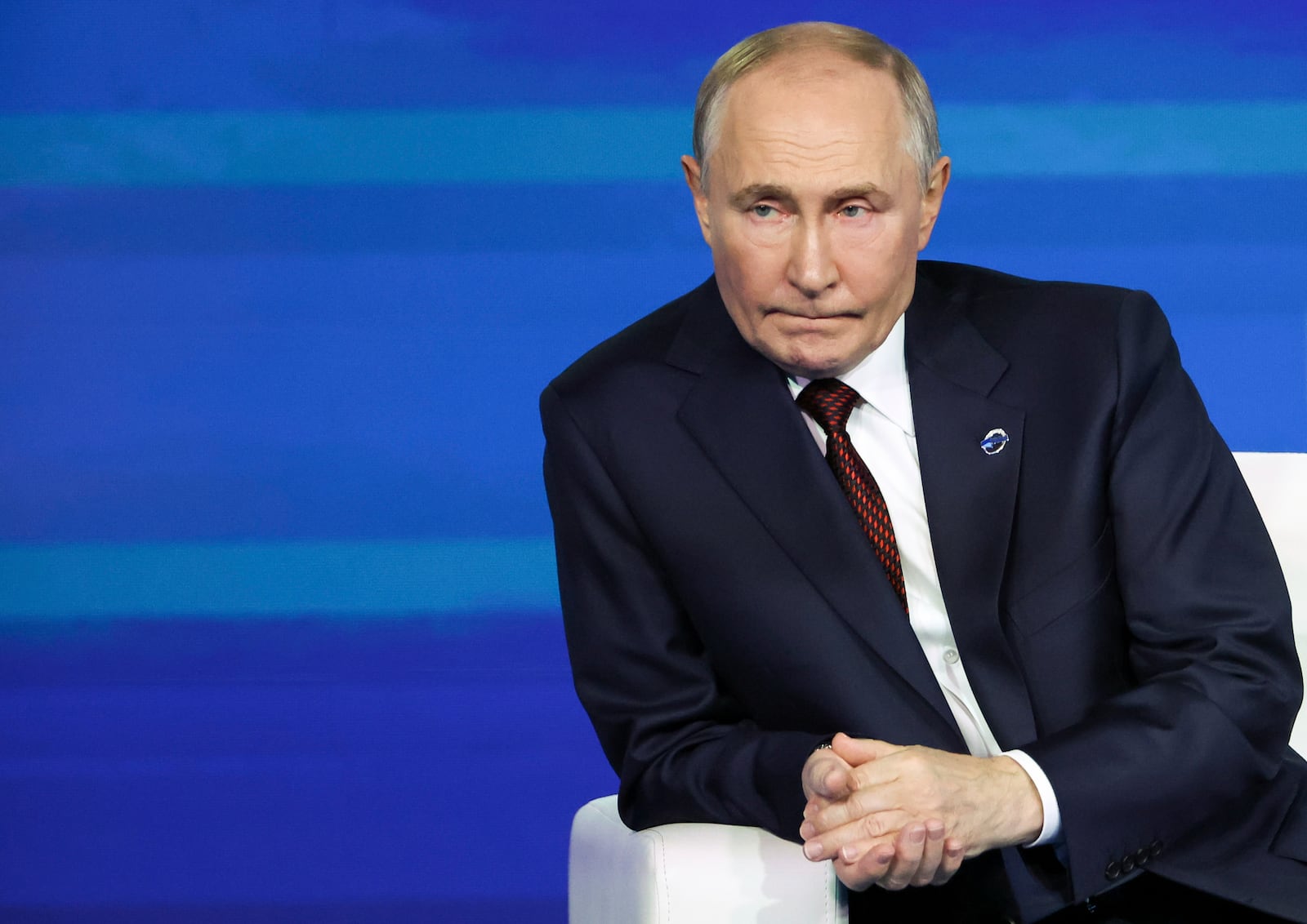 Russian President Vladimir Putin listens to a question during a meeting with foreign policy experts at the Valdai Discussion Club in the Black Sea resort of Sochi, Russia, Thursday, Nov. 7, 2024. (Maxim Shipenkov/Pool Photo via AP)