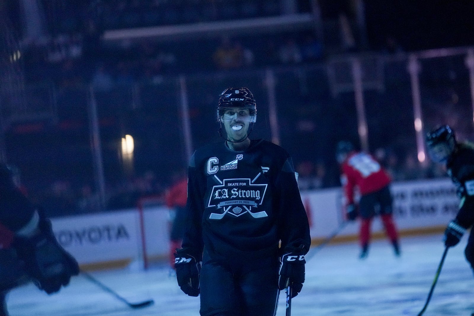 Team Black player singer Justin Bieber skates during the Skate for LA Strong celebrity hockey game, Sunday, Feb. 23, 2025, in Los Angeles. (AP Photo/Eric Thayer)