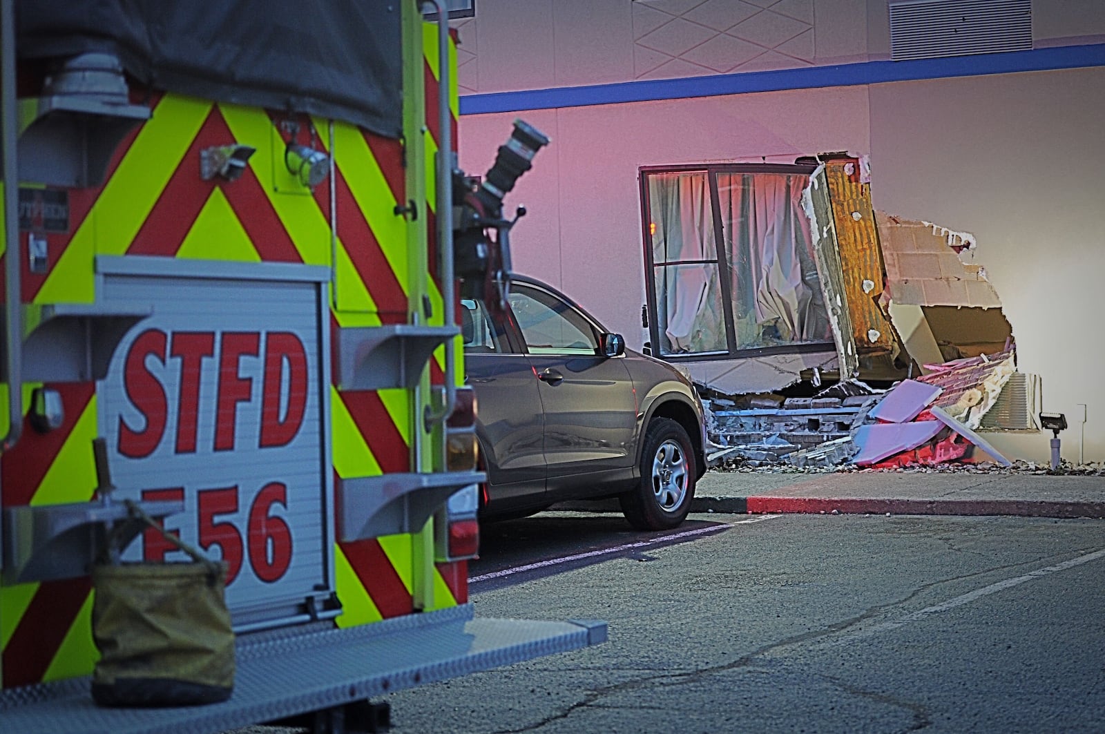 An SUV struck a Springfield Motel 6 room on Leffel Lane on Sunday evening. No one was seriously injured in the incident. MARSHALL GORBY/STAFF