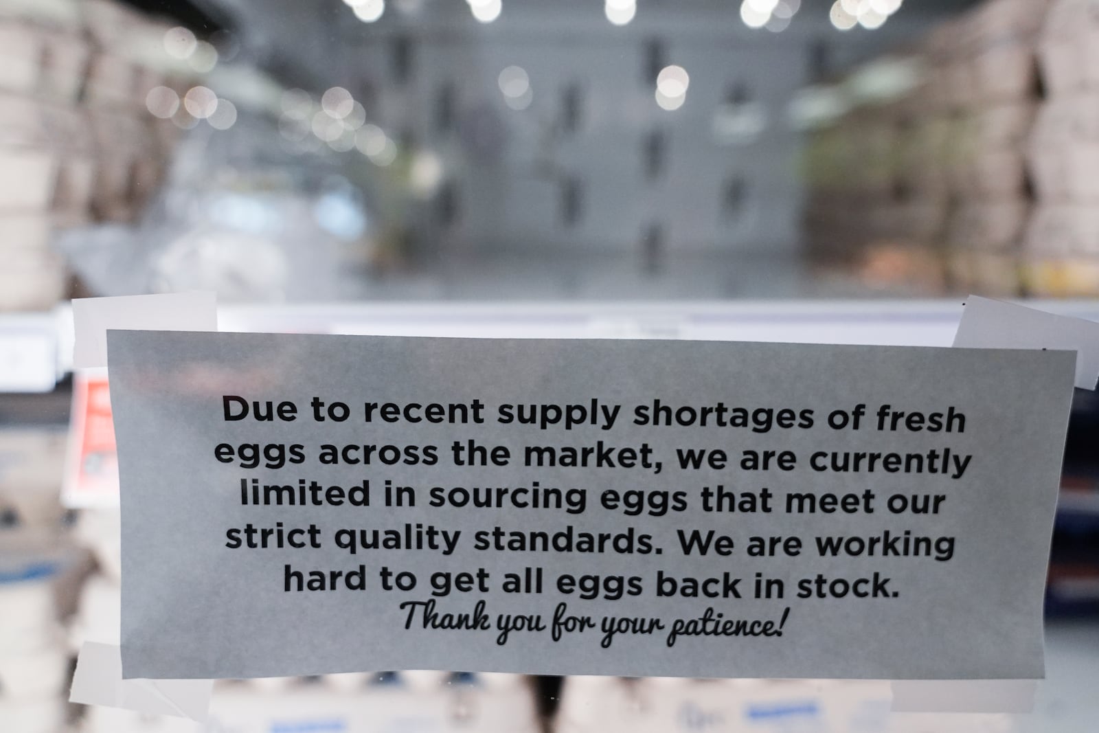 A sign notifying a supply shortage of fresh eggs is posted in the egg section at a QFC, Monday, Jan. 27, 2025, in Seattle. (AP Photo/Lindsey Wasson)