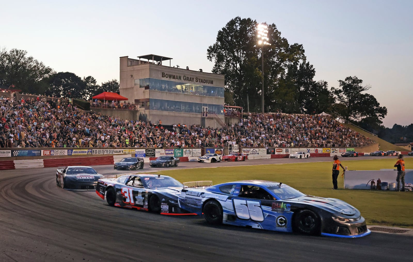 FILE - Zack Ore (55) leads Chase Roberston (31) in to turns one and two during the 40-lap Sportsman Series race on Saturday, Aug. 24, 2024 at Bowman Gray Stadium in Winston-Salem, N.C. (Walt Unks/The Winston-Salem Journal via AP, File)