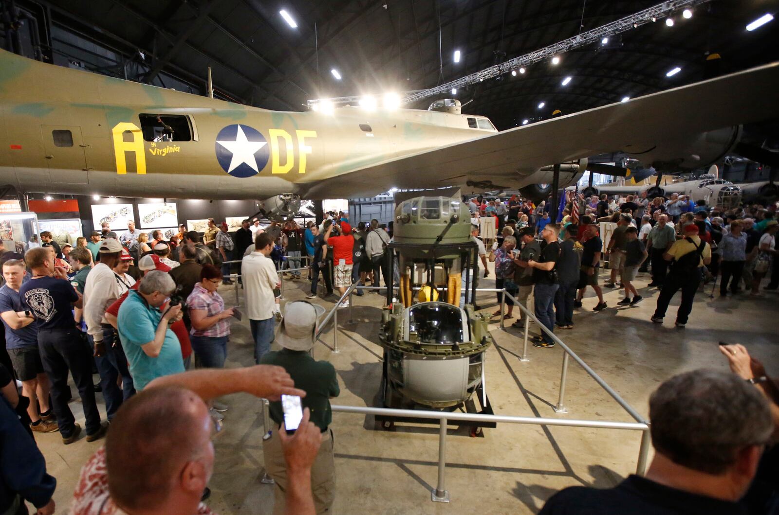 The National Museum of the U.S. Air Force opened the Memphis Belle exhibit to the public on Thursday after a 13-year restoration.  Staff and volunteers worked 55,000 hours to restore the iconic World War II bomber.    TY GREENLEES / STAFF