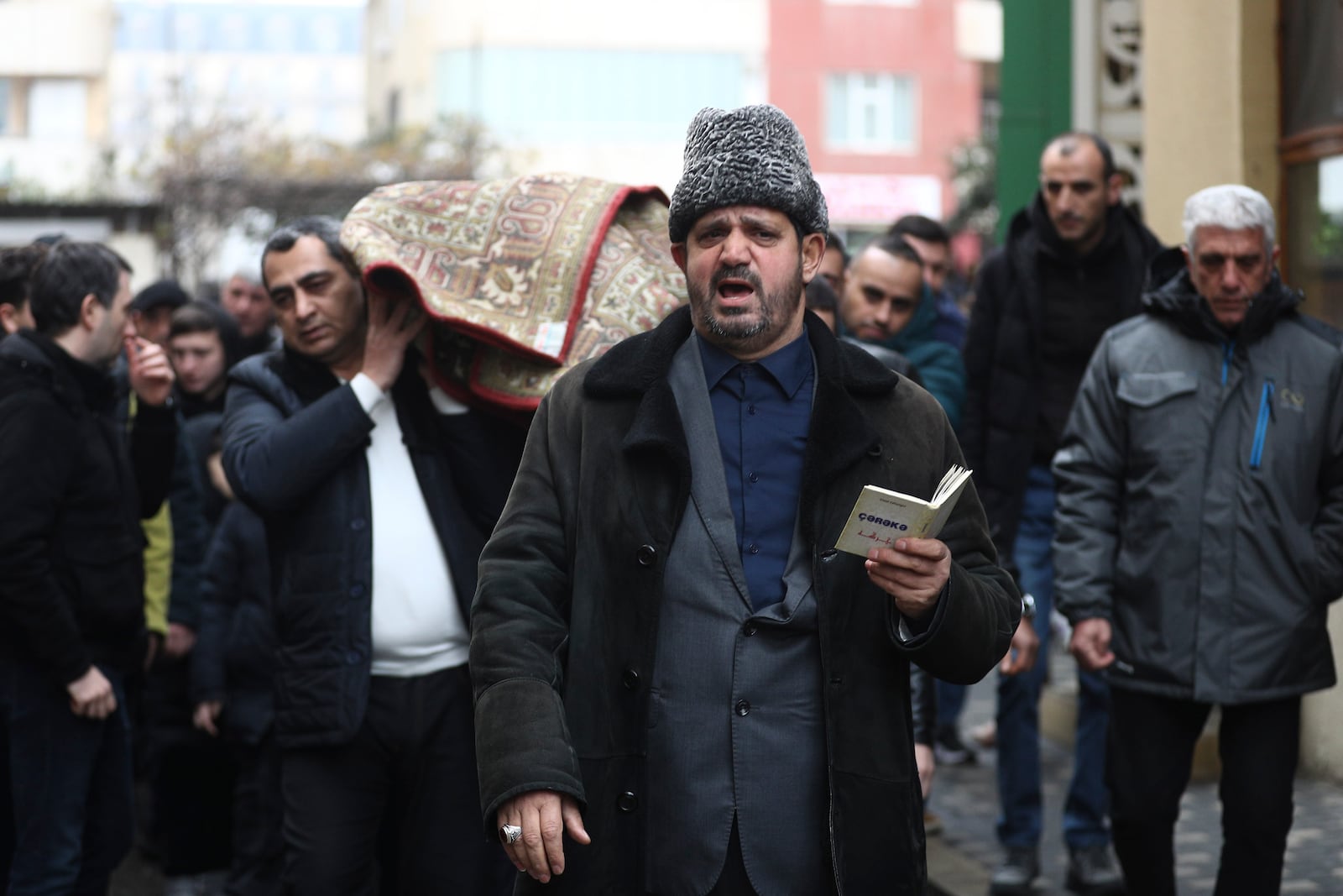 People attend a funeral of Mahammadali Eganov who died in the Azerbaijan Airlines Embraer 190 crash near the Kazakhstan's airport of Aktau at the age of 13, in Baku, Azerbaijan, Saturday, Dec. 28, 2024. (AP Photo)