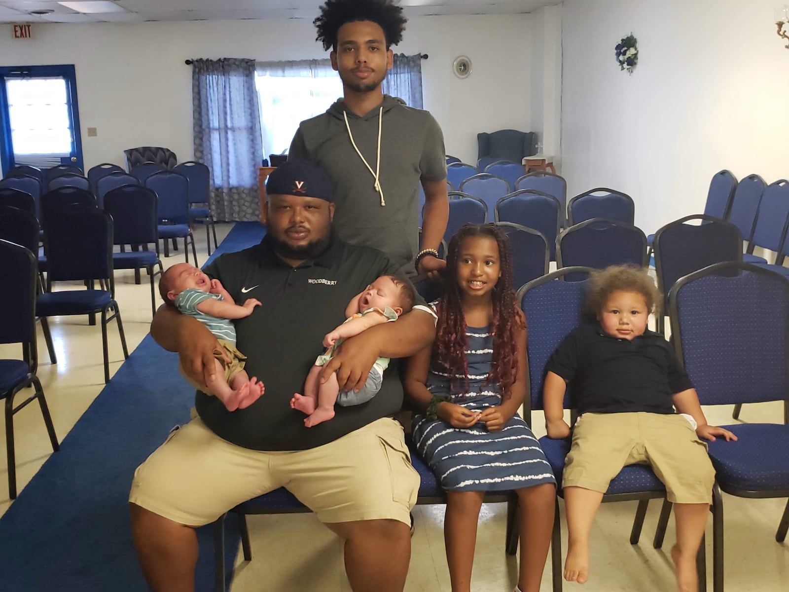 Cornell Strother and his children: Brayden, 15, top; 8-month-old twins, Isaiah and Isabella, in his arms; Sophia, 9, center, and; Malachi, 3, right.