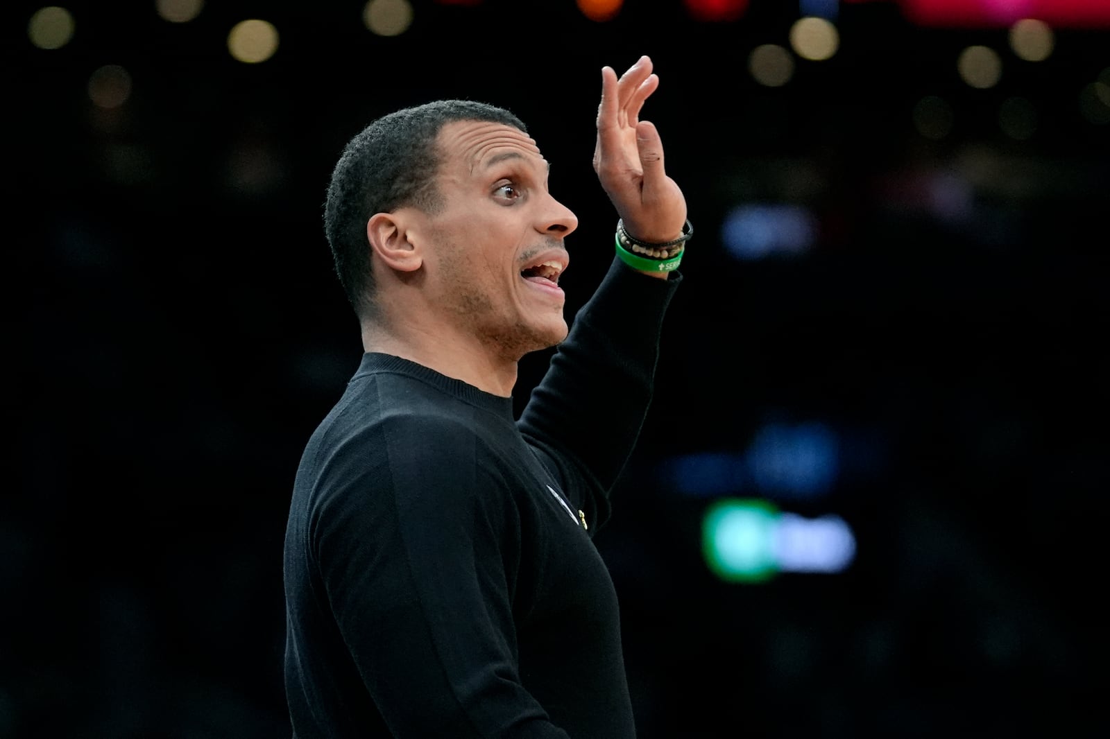 Boston Celtics head coach Joe Mazzulla shouts to his players in the first half of an NBA basketball game against the Chicago Bulls, Thursday, Dec. 19, 2024, in Boston. (AP Photo/Steven Senne)