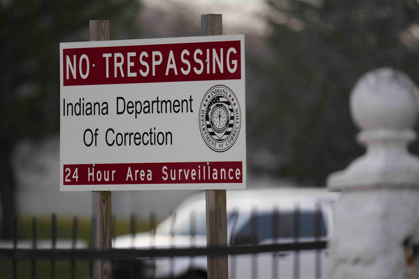 A sign is posted outside of Indiana State Prison where, barring last-minute court action or intervention by Gov. Eric Holcomb, Joseph Corcoran, 49, convicted in the 1997 killings of his brother and three other people, is scheduled to be put to death by lethal injection before sunrise Tuesday, Dec. 17, 2024, in Michigan City, Ind. (AP Photo/Erin Hooley)