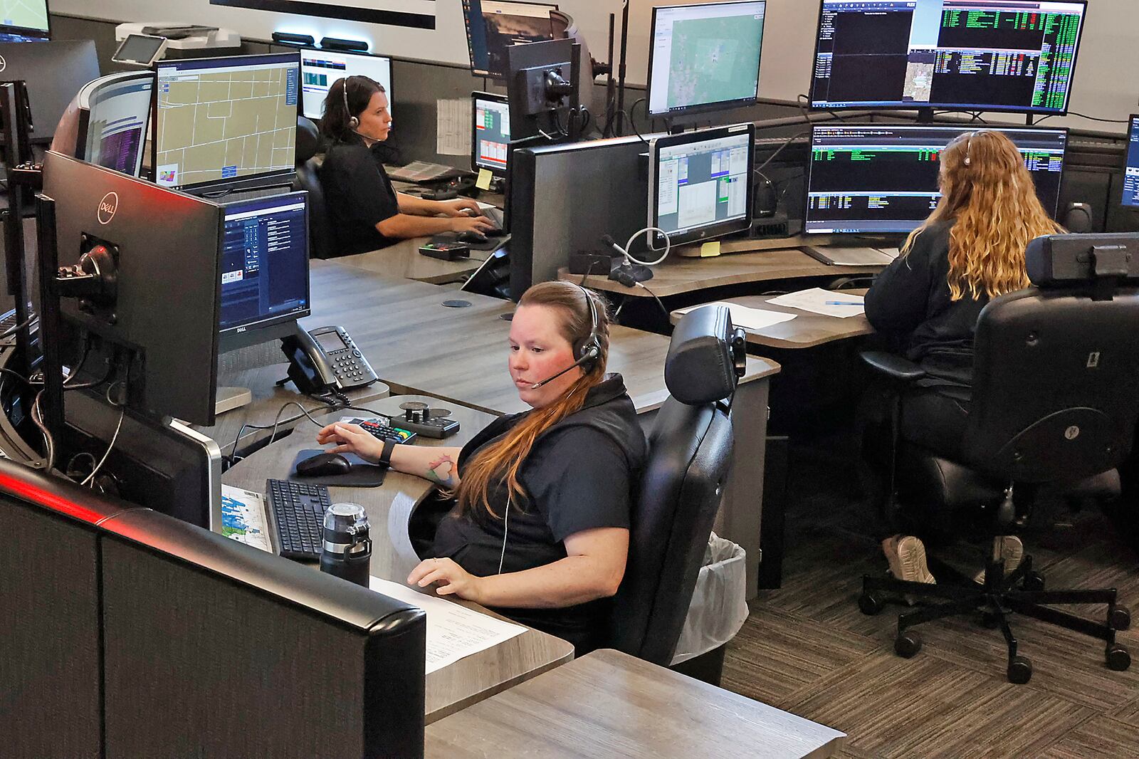 Dispatchers in the new 9-1-1 Communication Center at work Friday, August 25, 2023. BILL LACKEY/STAFF