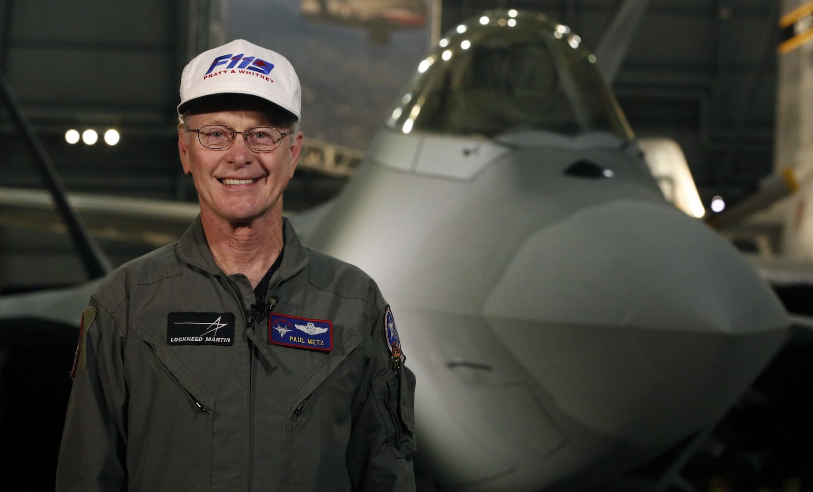 Former F-22 test pilot and Springfield native Paul Metz spoke at the National Museum of the U.S. Air Force in 2015. The Lockheed F-22A Raptor that Metz flew is on display in the museum. TY GREENLEES / STAFF