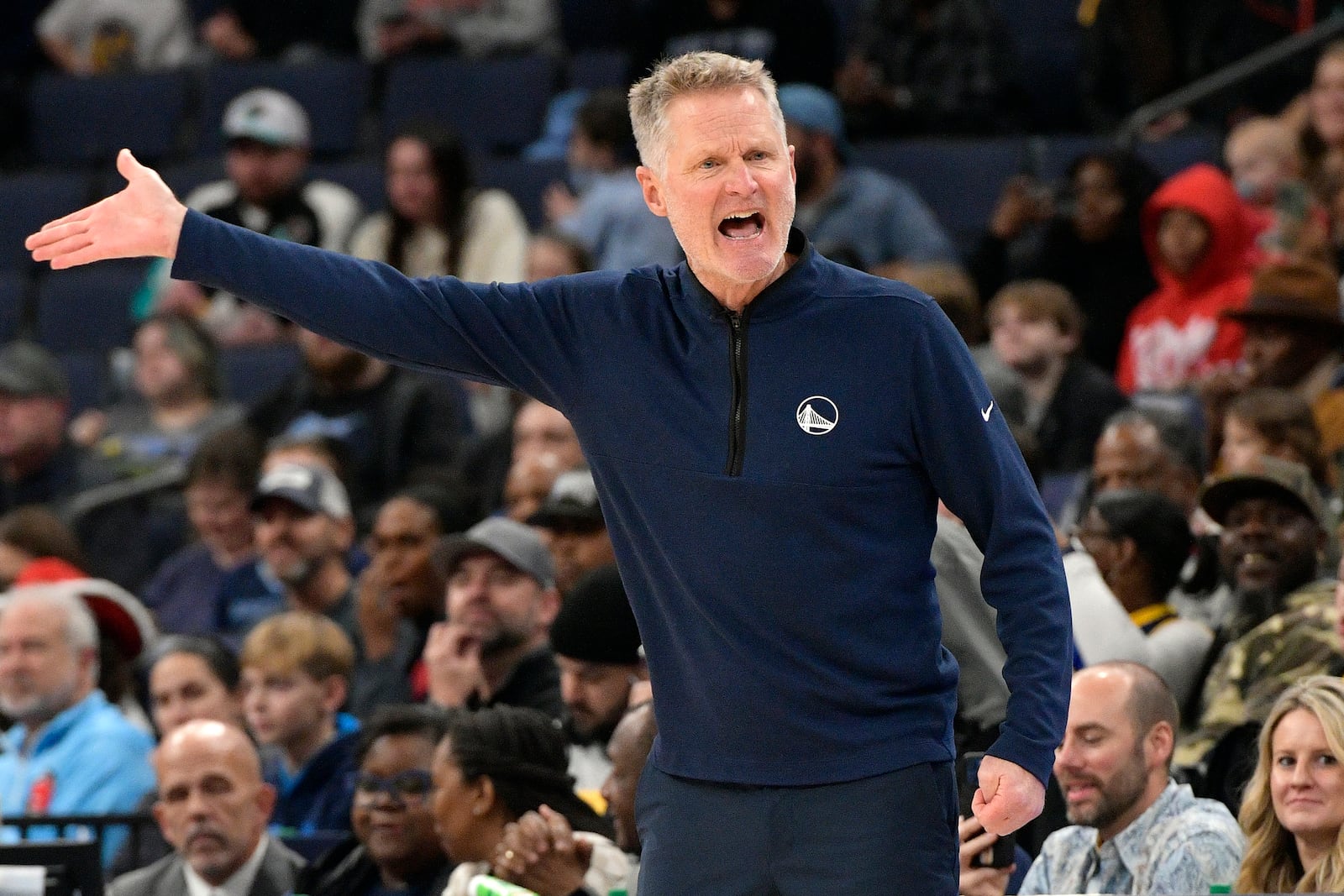 Golden State Warriors head coach Steve Kerr reacts to a referee's call in the first half of an NBA basketball game against the Memphis Grizzlies Thursday, Dec. 19, 2024, in Memphis, Tenn. (AP Photo/Brandon Dill)