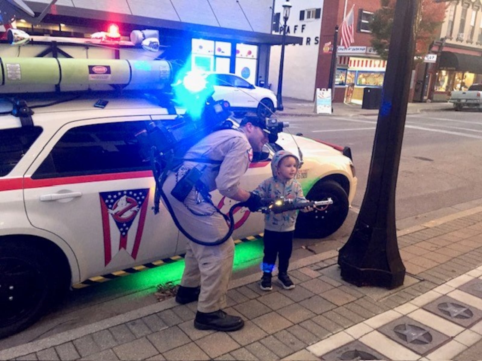 A young movie fan offers an assist at a screening of "Ghostbusters" at The Plaza in Miamisburg. Local independent theaters are using special events to fill seats. CONTRIBUTED