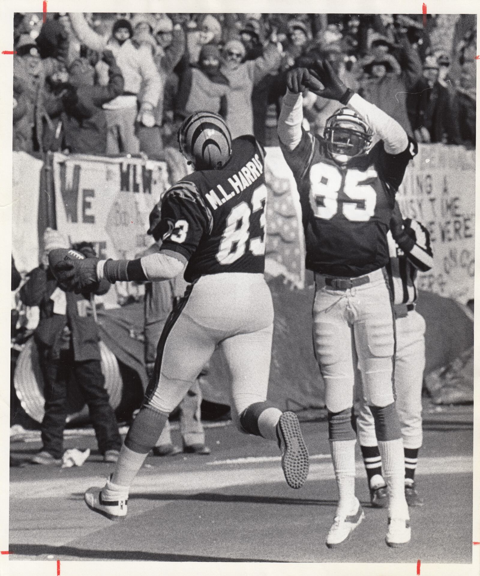 Bengals tight end M.L. Harris celebrates a first-quarter touchdown with teammate Isaac Curtis during the AFC championship game, Jan. 10, 1982. Harris' only catch of the game put Cincinnati ahead 10-0. Photo courtesy of DDN Collection at Wright State University Special Collections & Archives