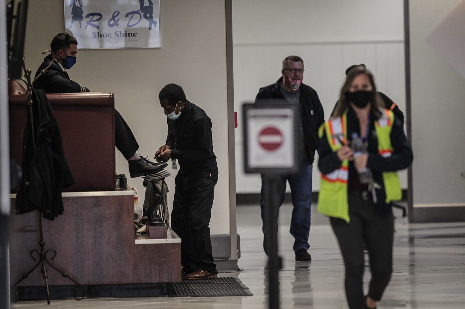 Shoe shiner, Michael Johnson, has been working at the Dayton International Airport for 36 years ."I'll be glad when the COVID goes away, Johnson said."