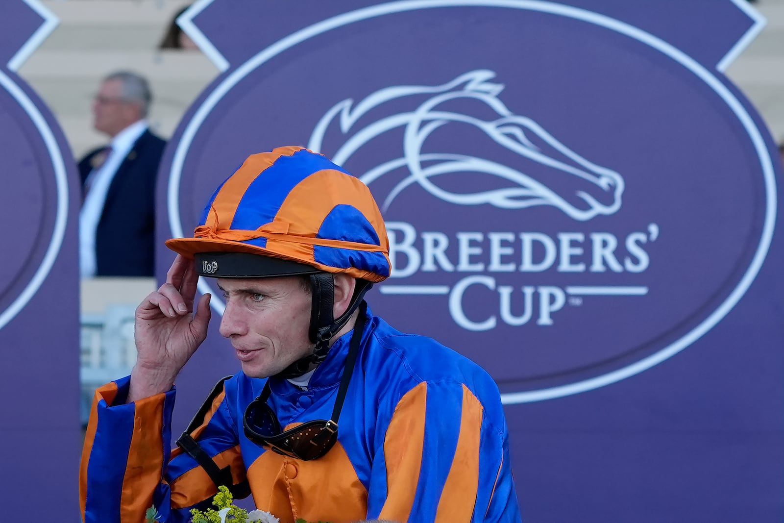 Ryan Moore celebrates after riding Lake Victoria to victory in the Breeders' Cup Juvenile Fillies Turf horse race at Santa Anita Park in Del Mar, Calif., Friday, Nov. 1, 2024. (AP Photo/Gregory Bull)