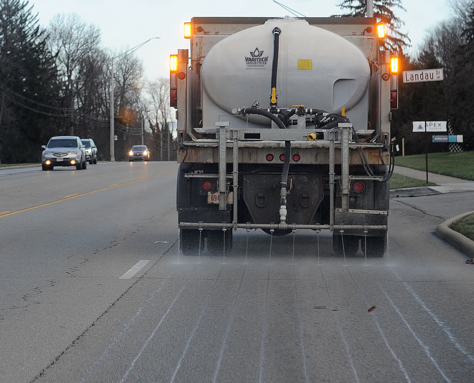 The city of Kettering prepared for upcoming snow on Wednesday, Jan. 5, 2022, by treating roads, including Far Hills Avenue, with deicer. MARSHALL GORBY\STAFF