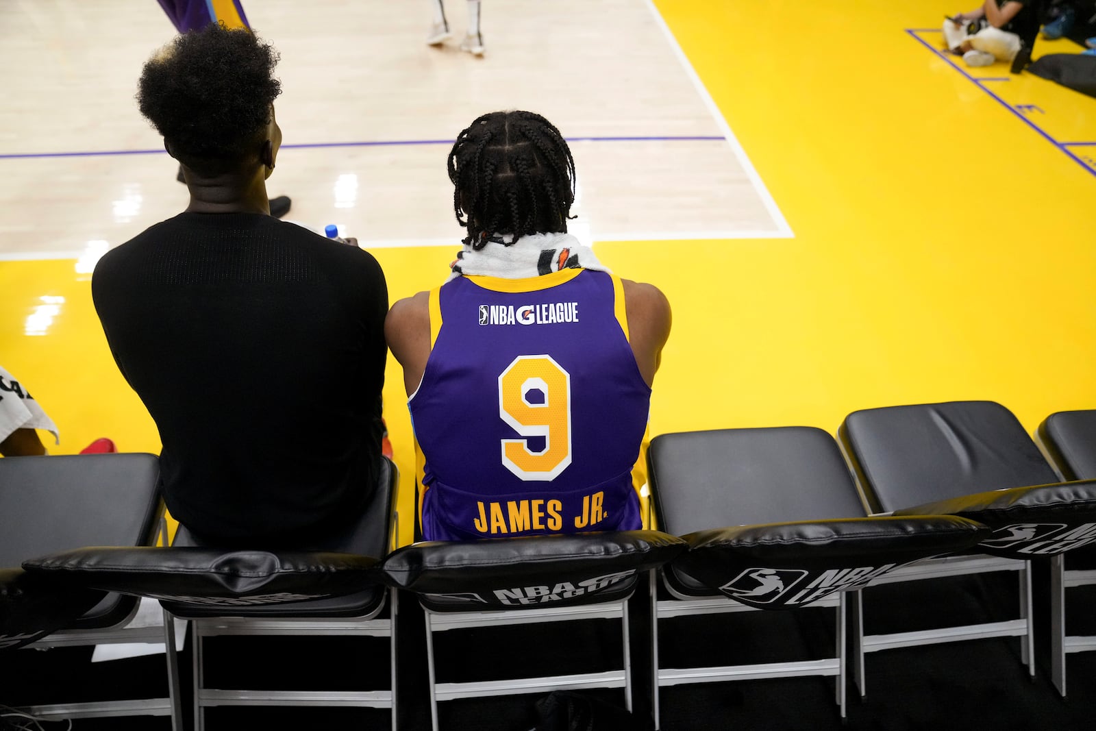 South Bay Lakers guard Bronny James (9) sits on the bench during halftime of an NBA G League basketball game against the Salt Lake City Stars, Saturday, Nov. 9, 2024, in El Segundo, Calif. (AP Photo/Eric Thayer)