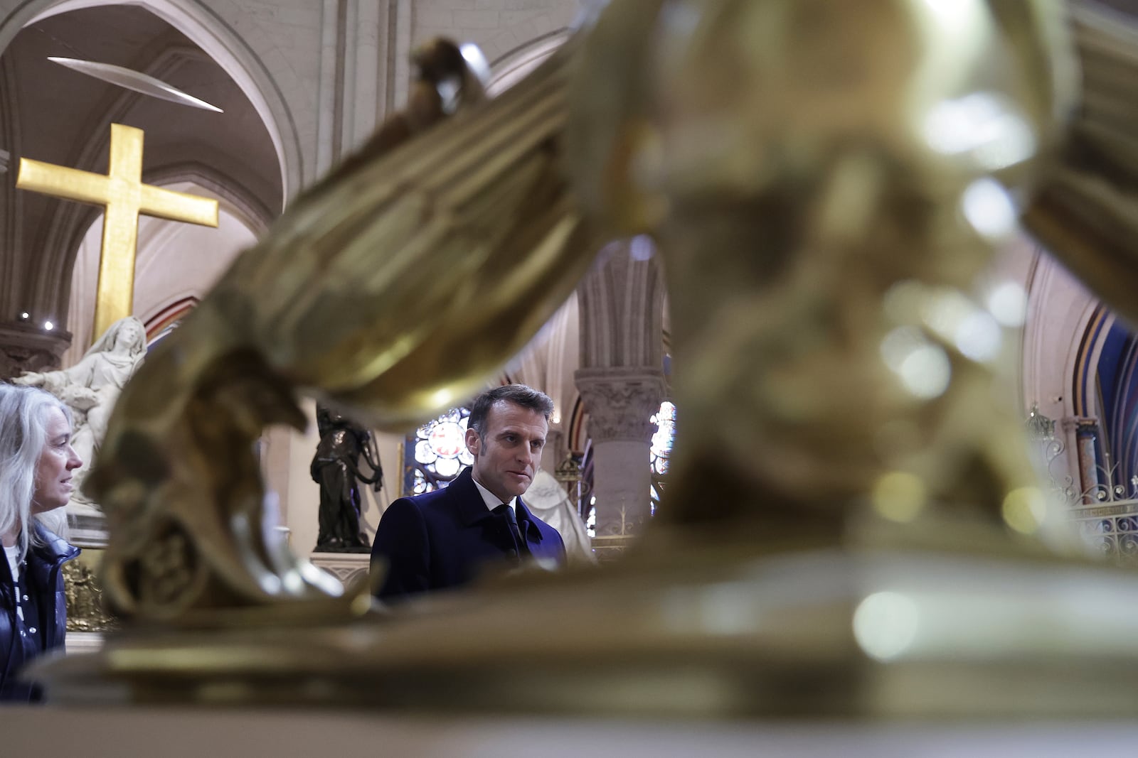 French President Emmanuel Macron visits the restored interiors Notre-Dame cathedral, Friday, Nov.29, 2024 in Paris. (Christophe Petit Tesson, Pool via AP)