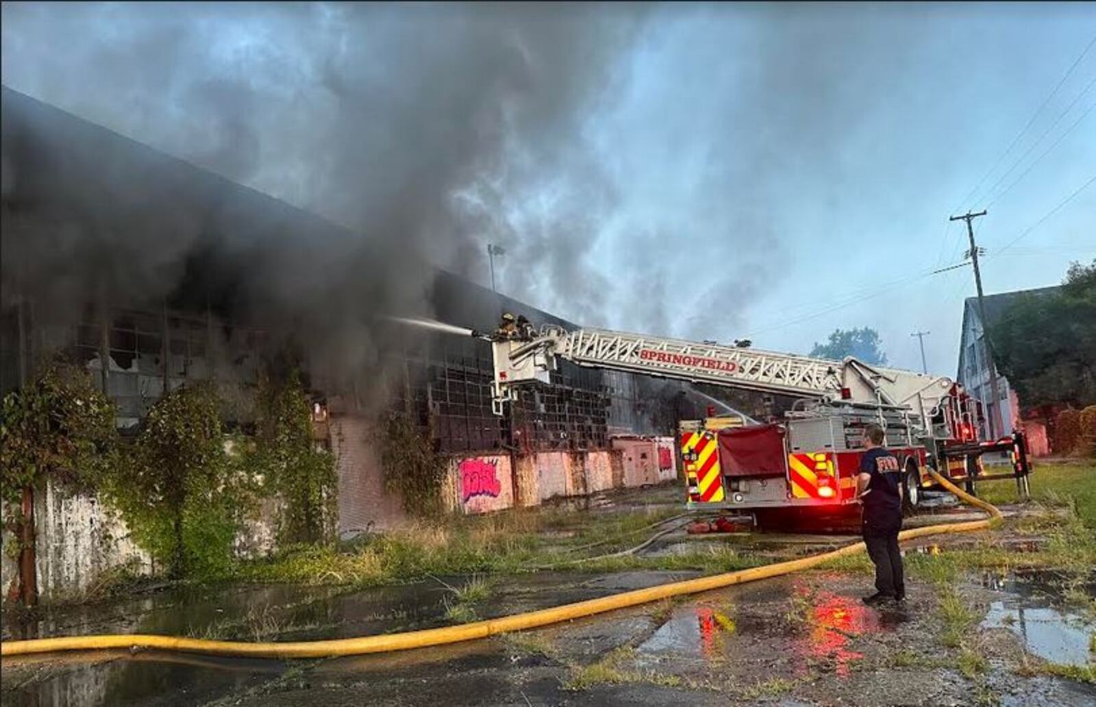 Firefighters battled a heavy fire at 801 Burt St. just after 5 a.m. on Sunday at large abandoned multi-building industrial complex. Contributed/Springfield Rescue Fire Division