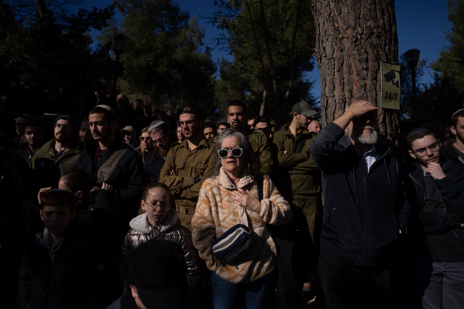 Mourners attend the funeral of Israeli soldier 1st Matityahu Ya'akov Perel, who was killed in a battle in the Gaza Strip, at the Mount Herzl military cemetery in Jerusalem, Israel, Thursday, Jan. 9, 2025. (AP Photo/Ohad Zwigenberg)