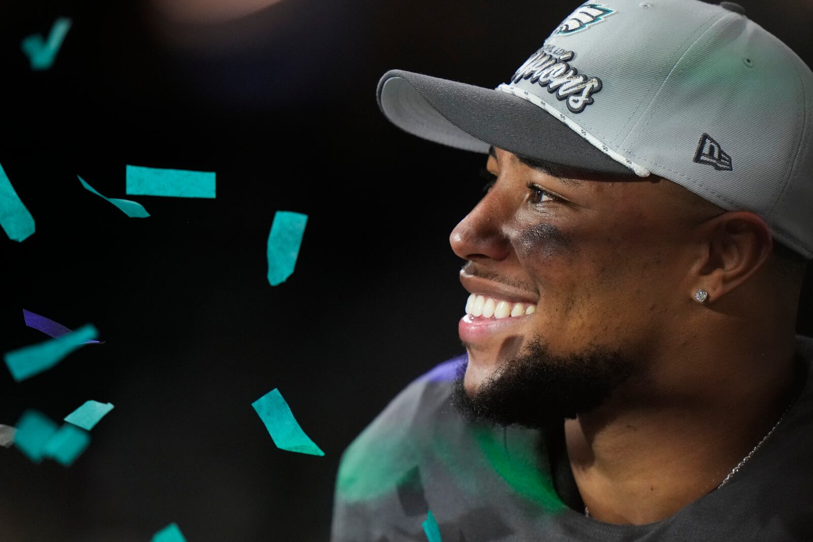 Philadelphia Eagles running back Saquon Barkley smiles after the NFL Super Bowl 59 football game against the Kansas City Chiefs, Sunday, Feb. 9, 2025, in New Orleans. (AP Photo/Frank Franklin II)