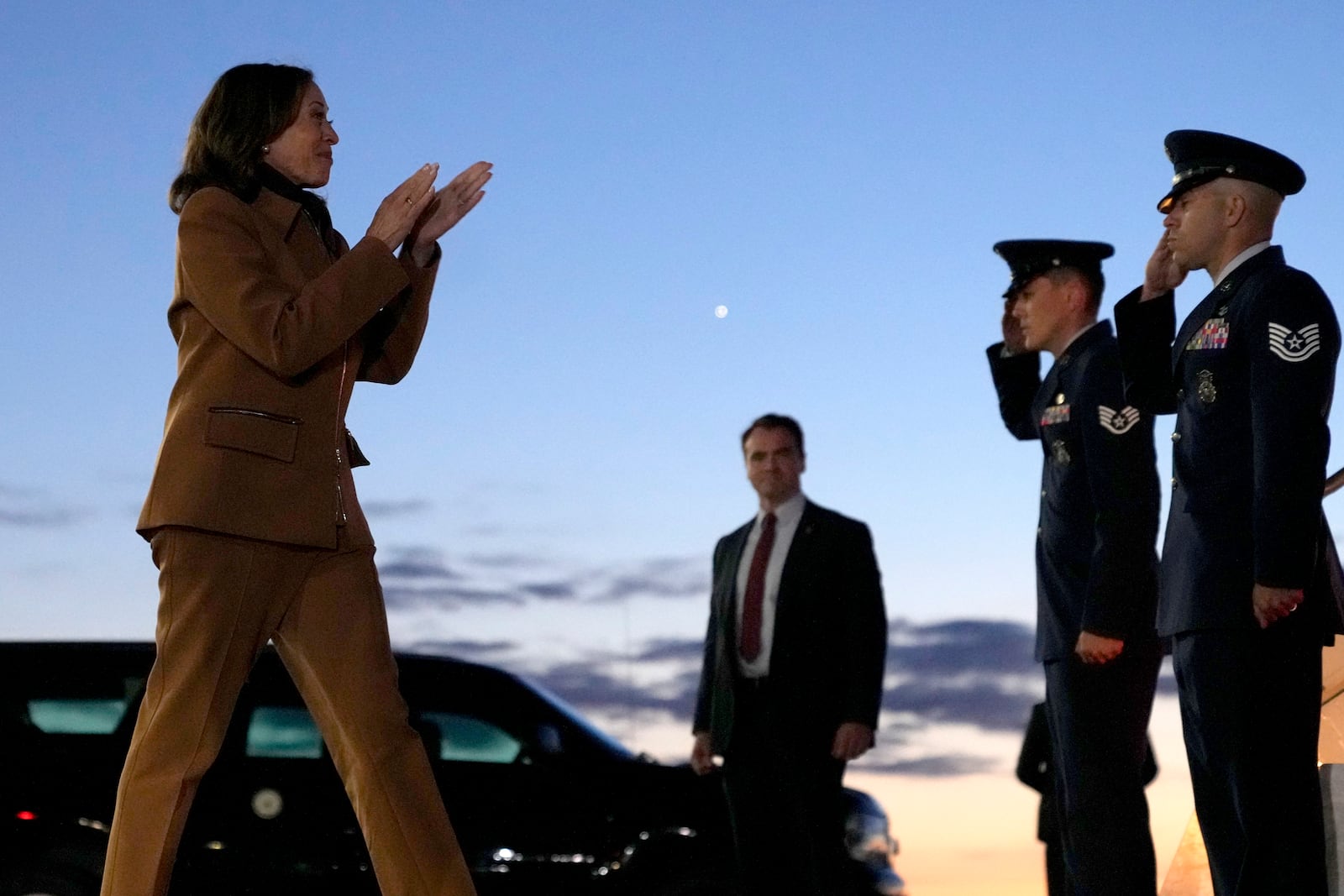 Democratic presidential nominee Vice President Kamala Harris walks to board Air Force Two at Kellogg Regional Airport, in Battle Creek, Mich., Saturday, Oct. 26, 2024. (AP Photo/Jacquelyn Martin)