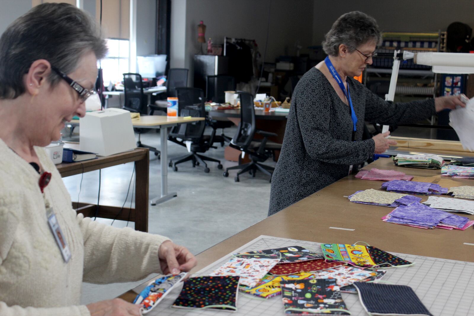 Since Friday, March  20,  Dayton Sewing Collaborative volunteers  in homes around  the community have made hundreds of  reusable face mask for local organization who need them as worries mount of the  coronavirus.  Volunteers Tursia Turner (left) and Bonnie Craigo are pictured.