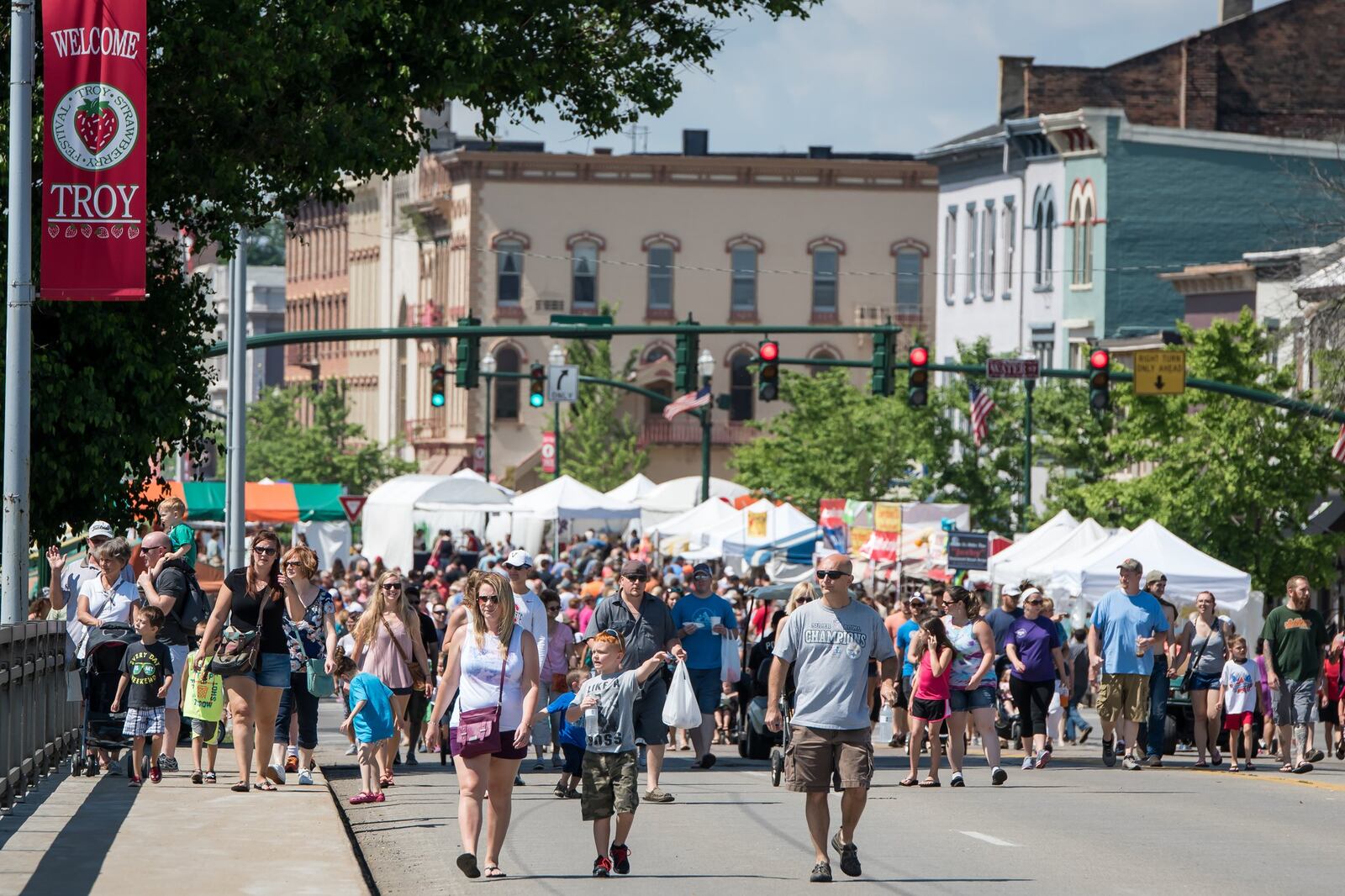 The annual Troy Strawberry Festival draws huge crowds to downtown Troy and the Great Miami River levee each June. Contributed photo. CONTRIBUTED