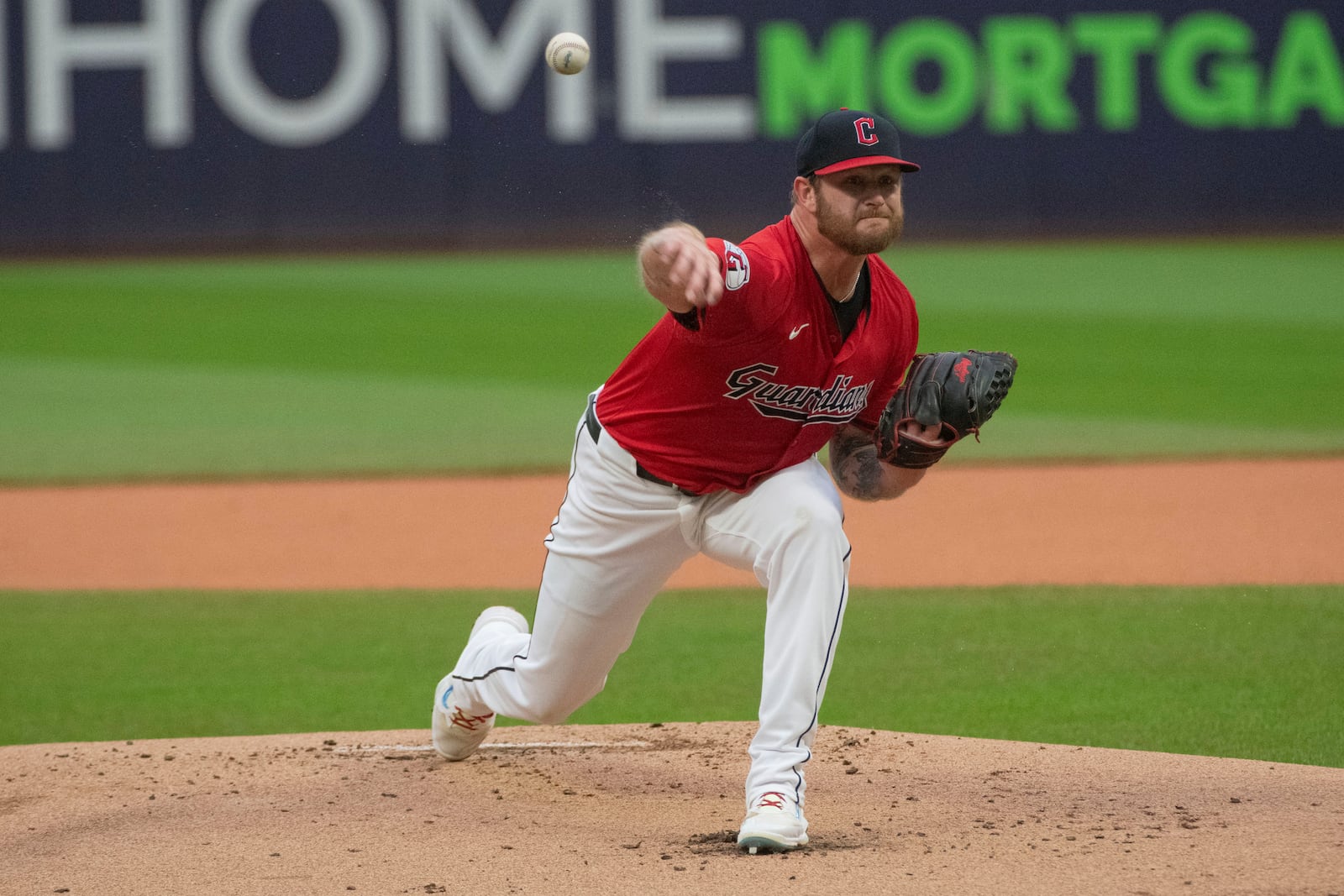 Cleveland Guardians starting pitcher Ben Lively delivers against the Houston Astros during the first inning of a baseball game in Cleveland, Saturday, Sept. 28, 2024. (AP Photo/Phil Long)