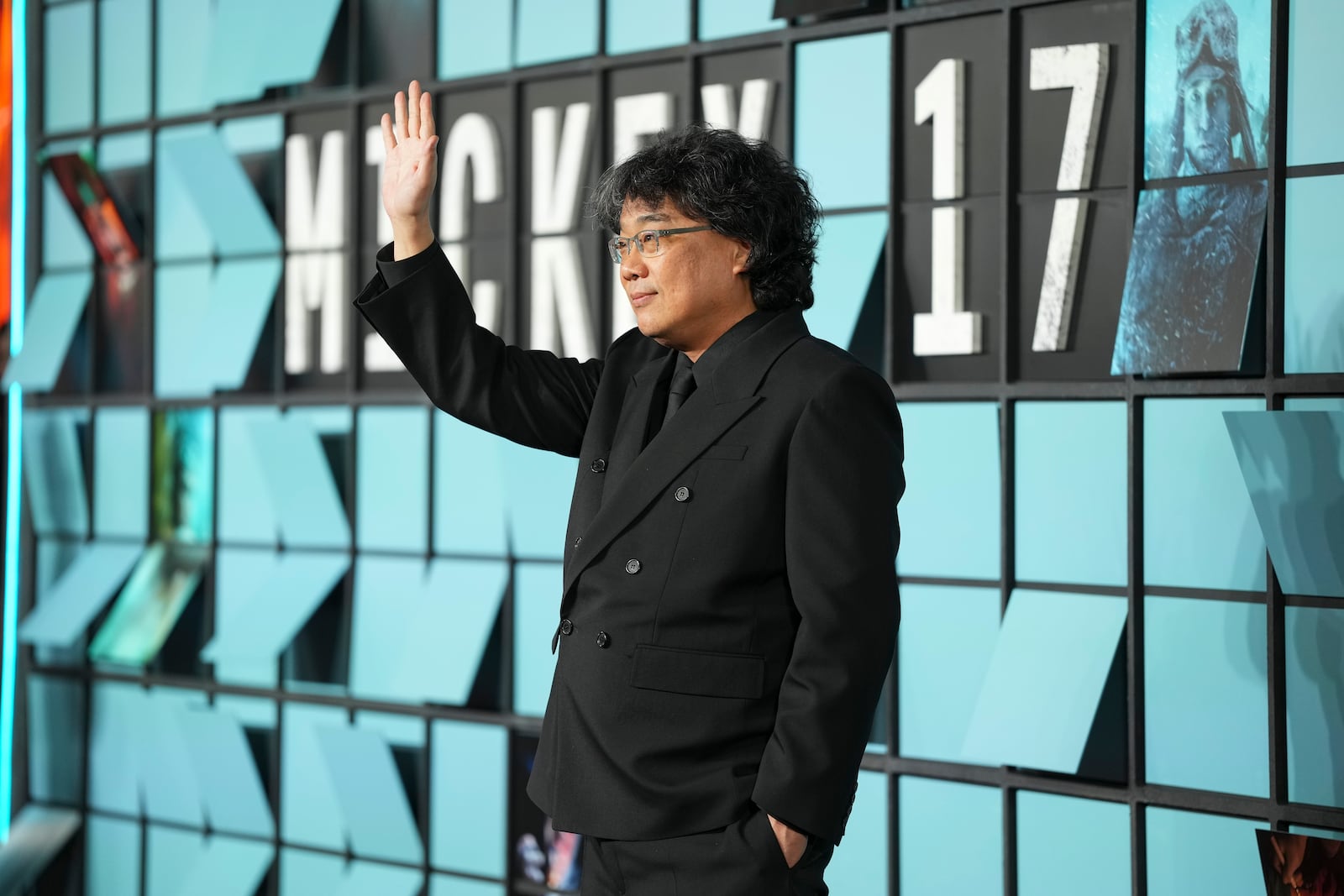 Director Bong Joon-Ho poses for photographers upon arrival at the World premiere for the film 'Mickey 17' on Thursday, Feb. 13, 2025, in London. (Photo by Scott A Garfitt/Invision/AP)