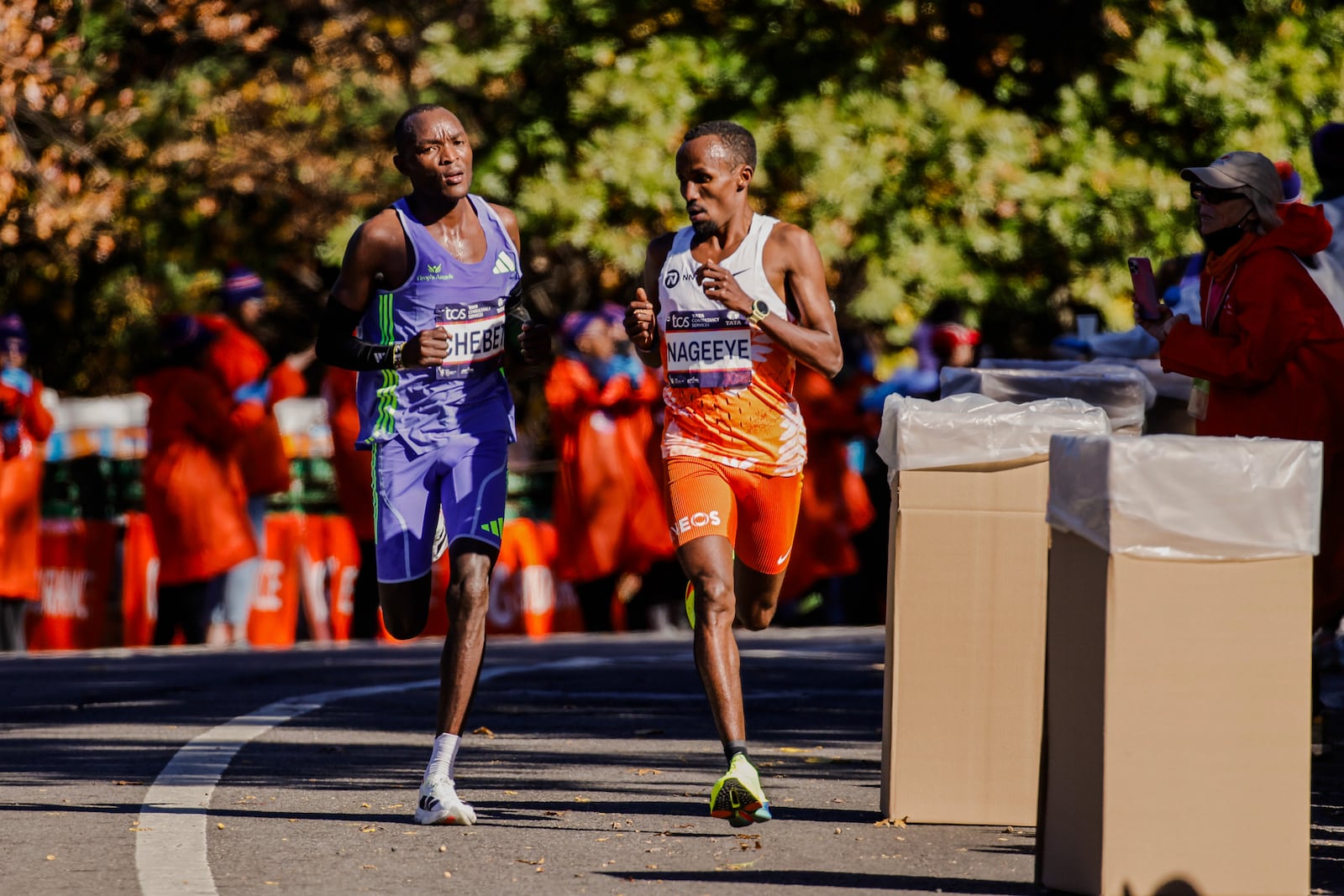 Abdi Nageeye, of the Netherlands, right, runs to crosses the finish line to win the men's division of the New York City Marathon, Sunday, Nov. 3, 2024, in New York. (AP Photo/Eduardo Munoz Alvarez)