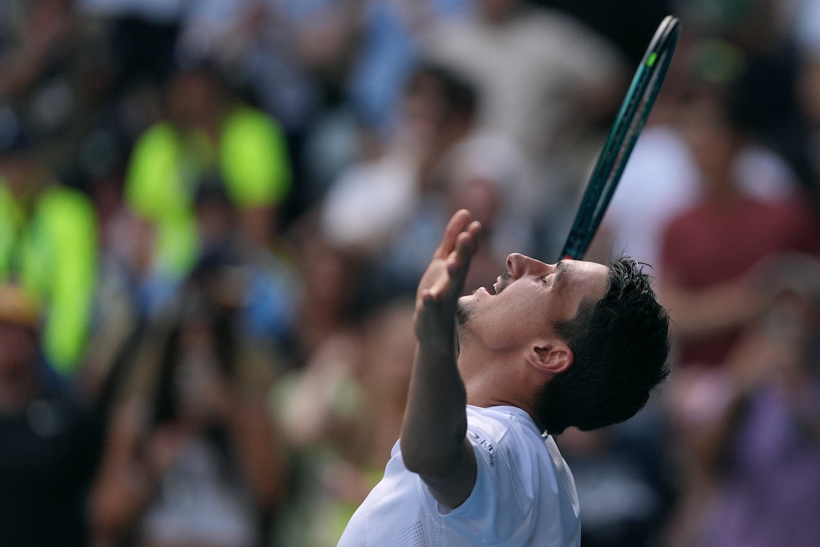 Lorenzo Sonego of Italy celebrates after defeating Learner Tien of the U.S. in their fourth round match at the Australian Open tennis championship in Melbourne, Australia, Monday, Jan. 20, 2025. (AP Photo/Ng Han Guan)