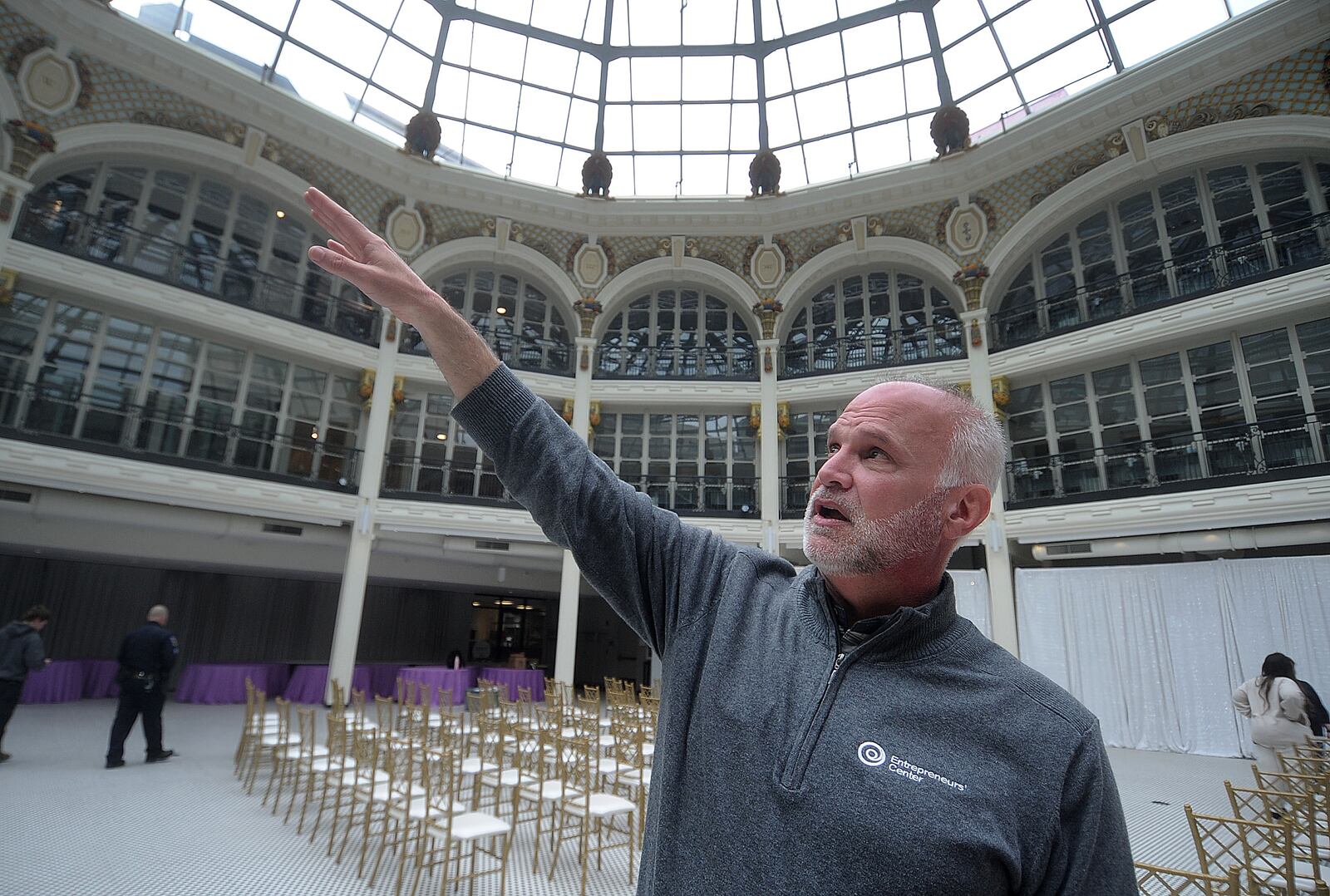 Scott Koorndyk, president of the Entrepreneurs' Center, which is located in The Hub Powered by PNC Bank at the Arcade in downtown Dayton. Some entrepreneurs using the center's services are in offices on the upper level of the Arcade, overlooking the rotunda. MARSHALL GORBY\STAFF