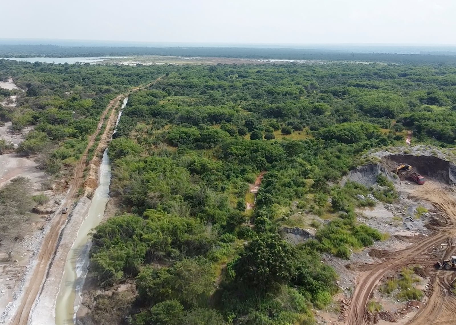 This image taken from video Wednesday, Feb. 19, 2025, shows the path of mine waste in a river near a Sino-Metals Leach Zambia mine near Kitwe. (AP Photo/Richard Kille )