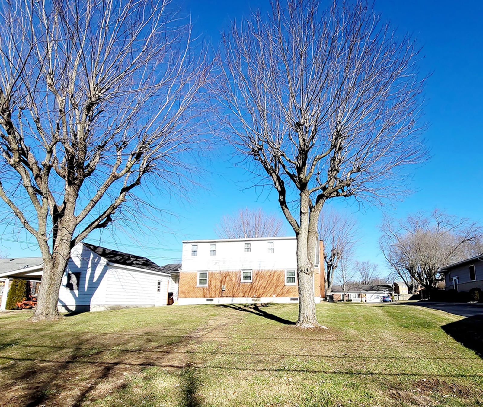 The rear of the property is bordered by a stream and features a 1-car, detached garage. CONTRIBUTED PHOTO