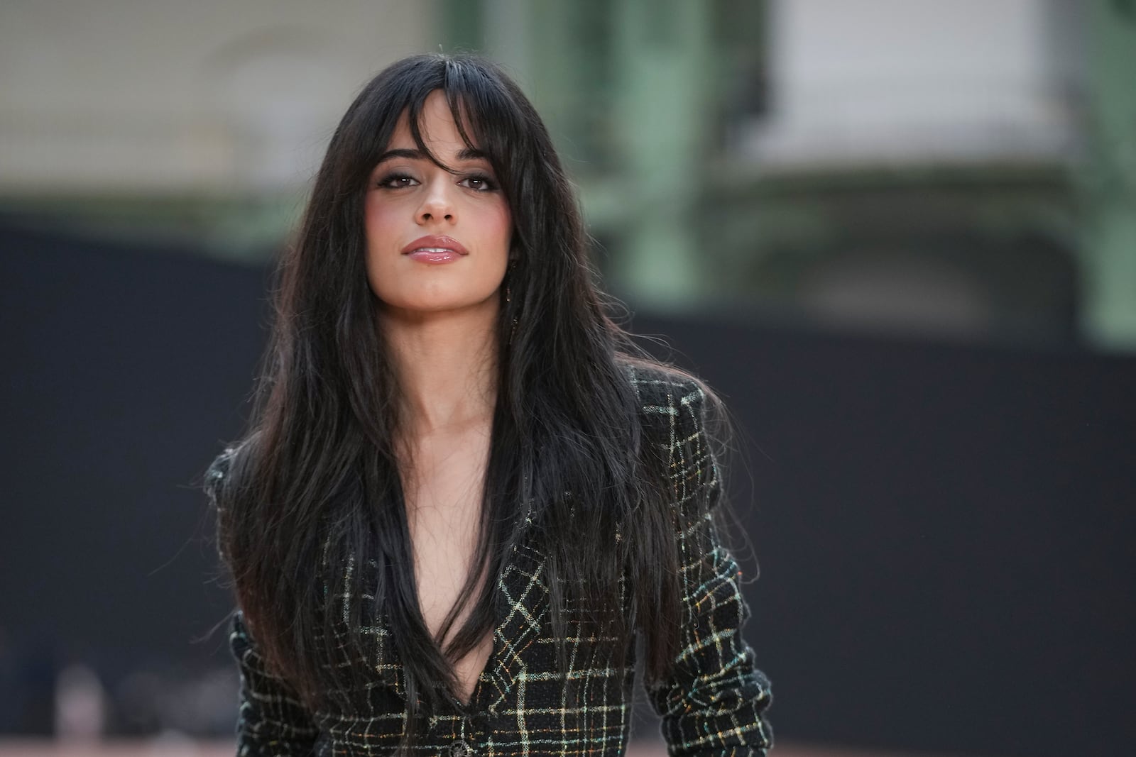 Camila Cabello arrives for the the Chanel Fall/Winter 2025-2026 Womenswear collection presented Tuesday, March 11, 2025. in Paris. (AP Photo/Christophe Ena).