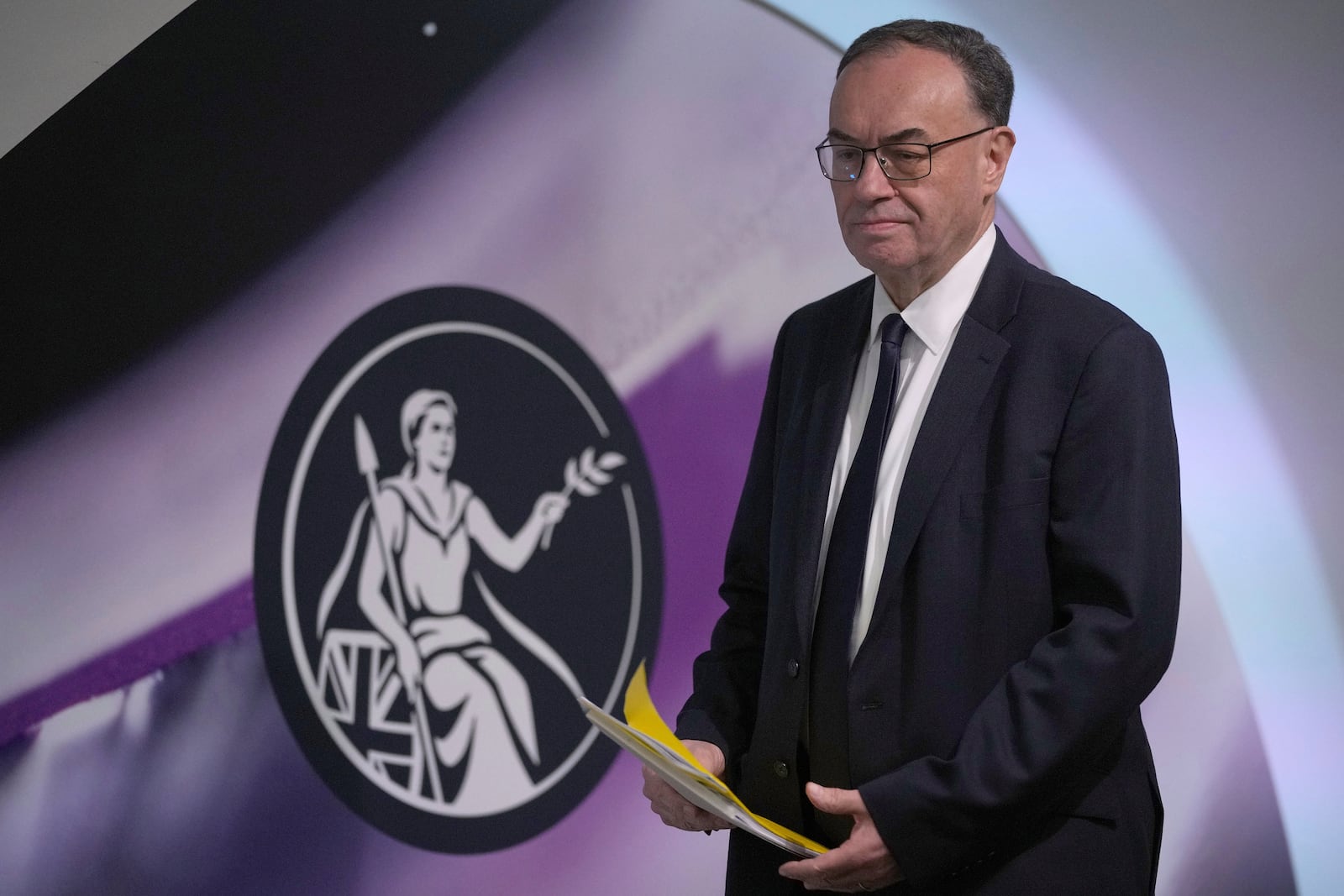 Andrew Bailey, Governor of the Bank of England, arrives for the Monetary Policy Report press conference in London, Thursday, Feb. 6, 2025.(AP Photo/Kin Cheung, Pool)