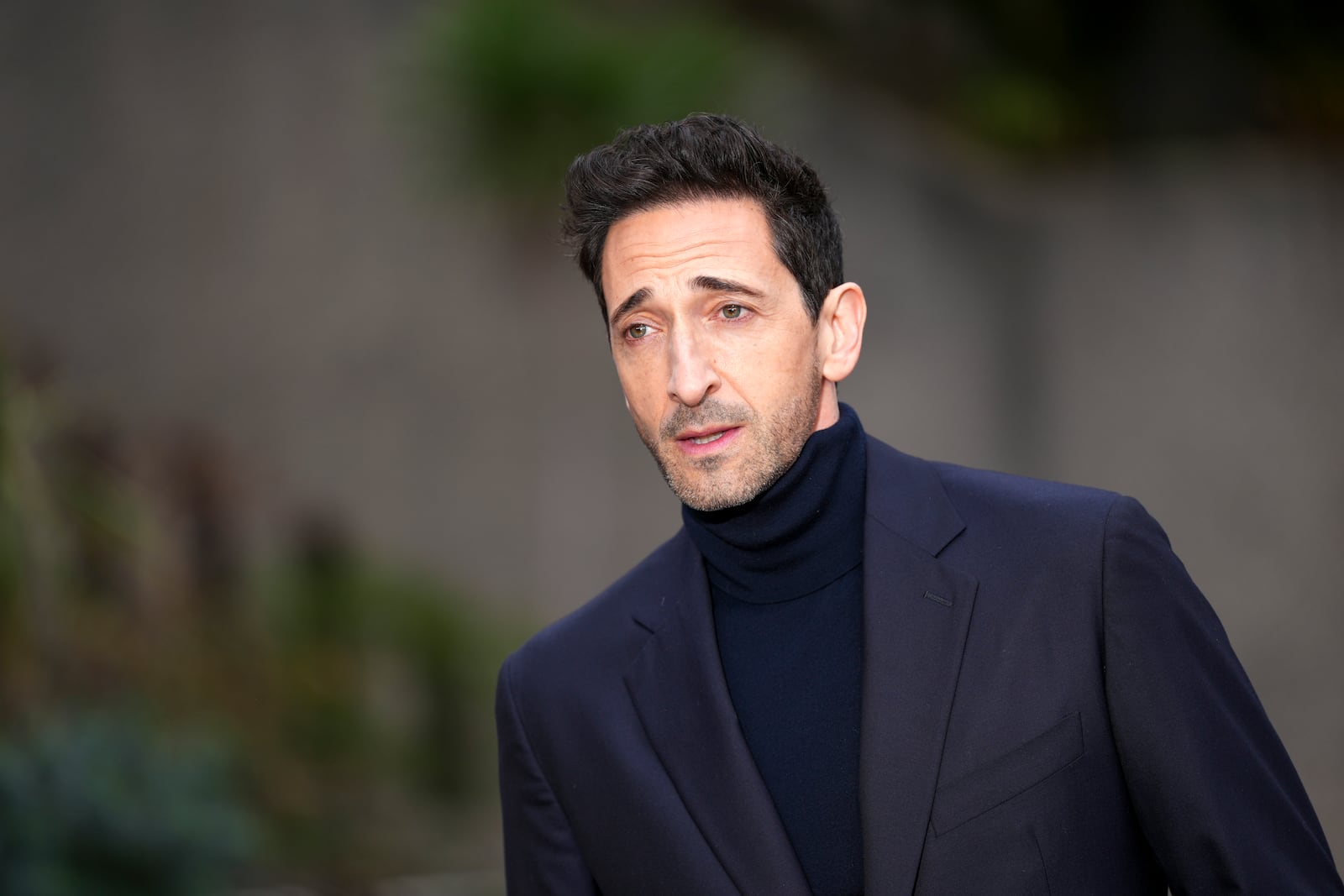 Adrien Brody poses for photographers upon arrival at the photo call for the film 'The Brutalist' in London, on Wednesday, Jan. 15, 2025. (Photo by Scott A Garfitt/Invision/AP)