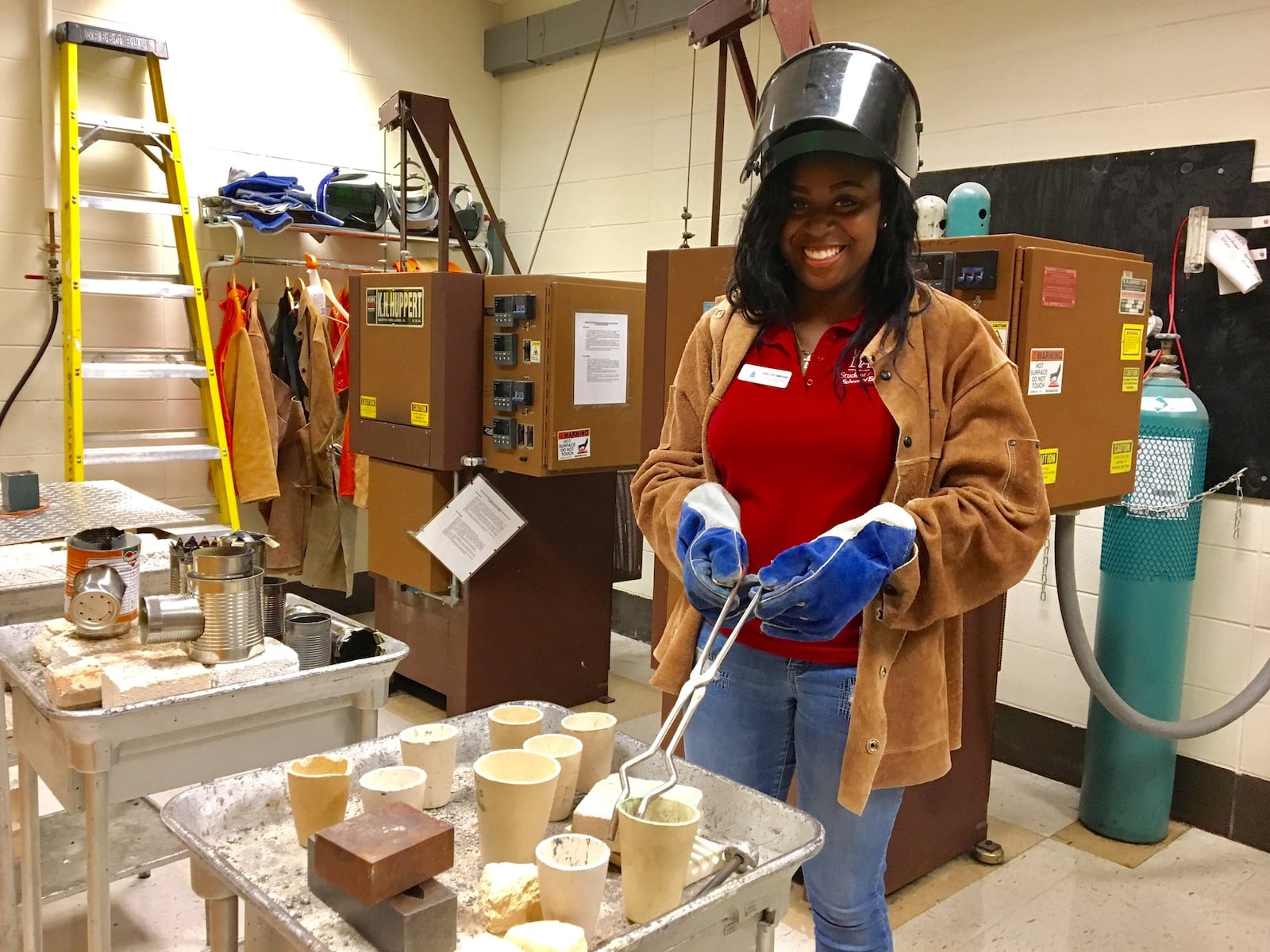 Kirsten Simpson, a junior studying industrial engineering at the University of Dayton, works in the materials lab at the university. UD is trying to grow the number of women engineers it turns out in order to keep up with a growing workforce demand for more female and minority engineers, officials said. Women make up about 28 percent of freshmen engineering class this year at UD, a record high for the institution.