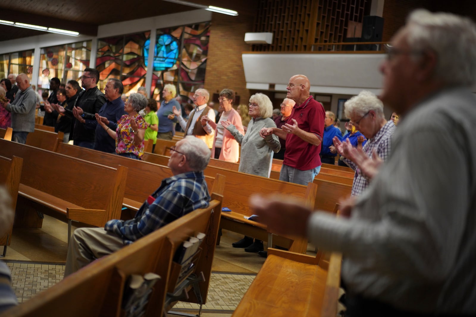 Congregants attend the English-language Mass at St. Mary’s Catholic Church on Saturday, Oct. 19, 2024, in Worthington, Minn. (AP Photo/Jessie Wardarski)