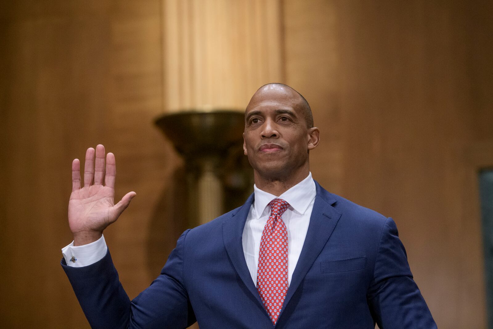 Eric Scott Turner, President-elect Donald Trump's nominee to be Secretary of Housing and Urban Development, is sworn-in during a Senate Committee on Banking, Housing, and Urban Affairs hearing for his pending confirmation on Capitol Hill, Thursday, Jan. 16, 2025, in Washington. (AP Photo/Rod Lamkey, Jr.)