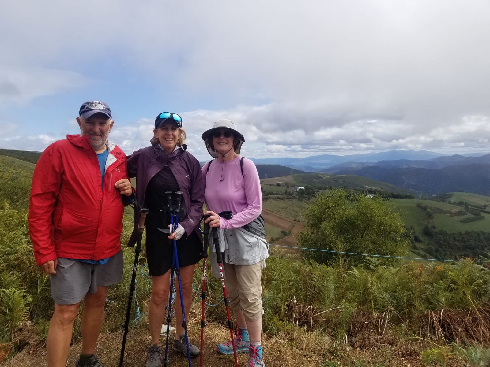 Norm Essman, Gail Krentz and Persis Ellwood stop to view the countryside. CONTRIBUTED