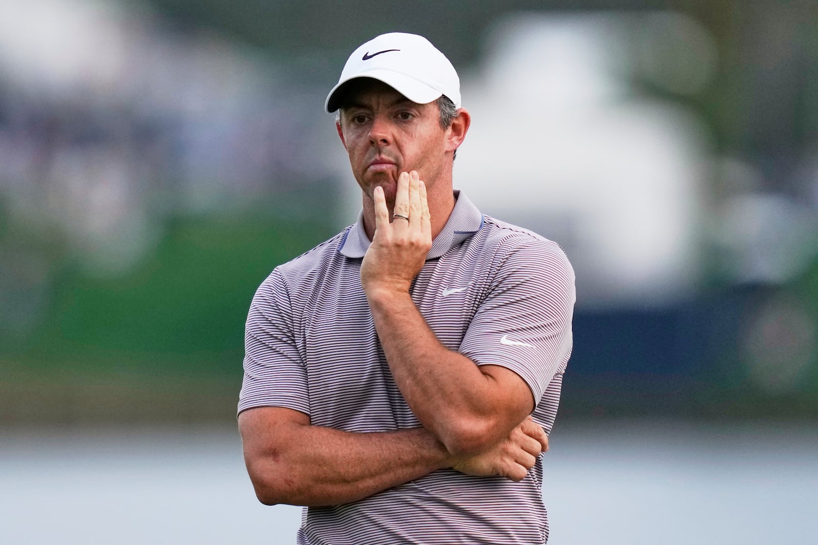 Rory McIlroy, of Northern Ireland, reacts to his putt on the 18th green during the final round of The Players Championship golf tournament Sunday, March 16, 2025, in Ponte Vedra Beach, Fla. (AP Photo/Julia Demaree Nikhinson)