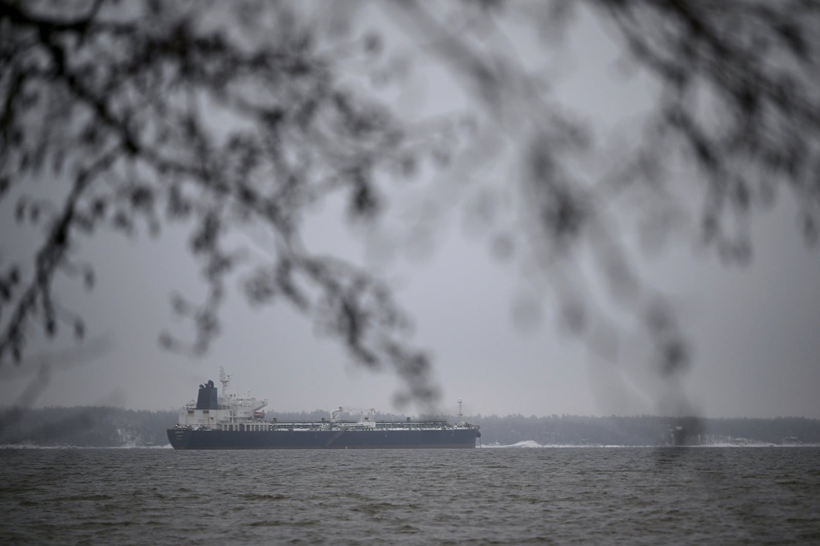 FILE – The oil tanker Eagle S, suspected of the disruption of the Finland-Estonia power cable Estlink-2, is anchored near the port of Kilpilahti in Porvoo on the Gulf of Finland, on Tuesday, Jan. 7, 2025. (Antti Aimo-Koivisto/Lehtikuva via AP, File)