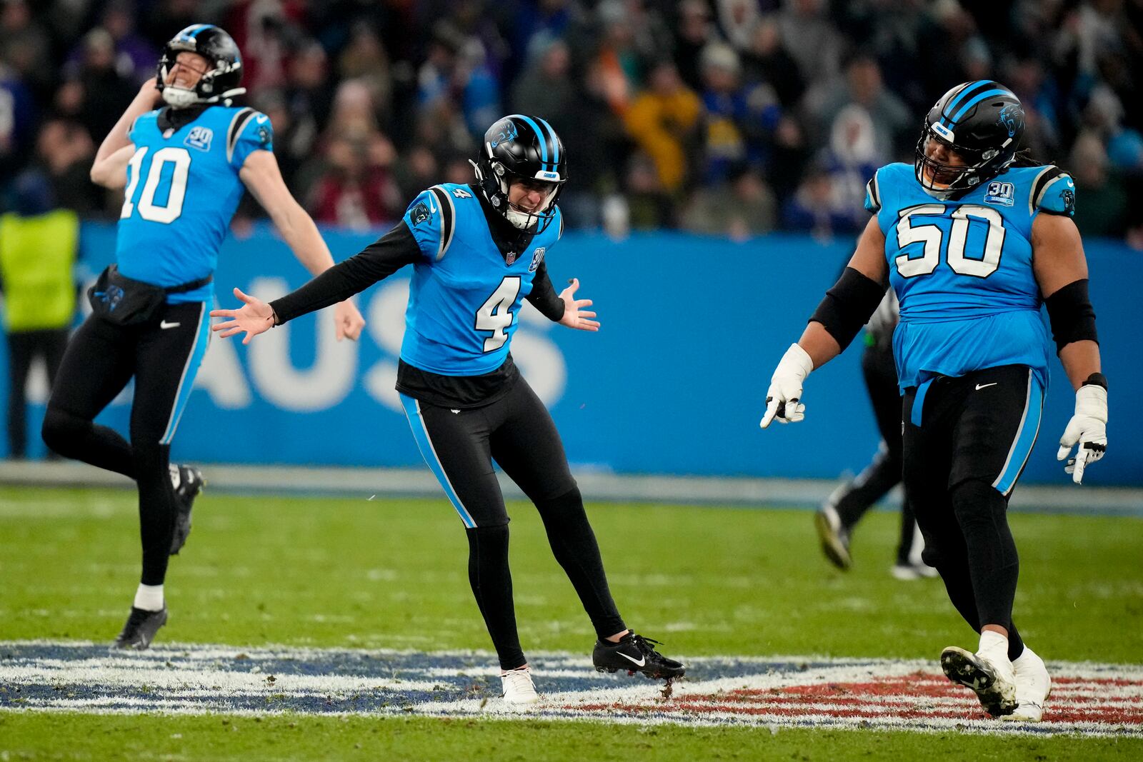 Carolina Panthers kicker Eddy Pineiro celebrates after kicking the game-winning field goal in overtime against New York Giants during an NFL football game, Sunday, Nov. 10, 2024, in Munich, Germany. (AP Photo/Matthias Schrader)