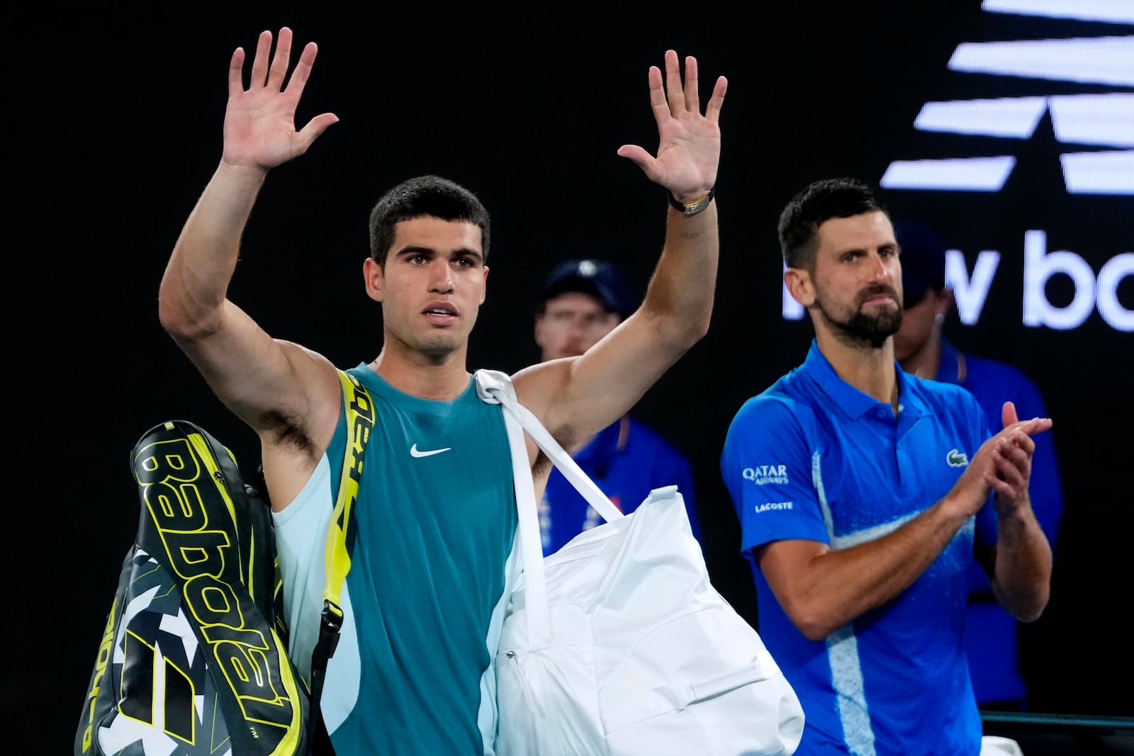 Carlos Alcaraz of Spain waves following. His quarterfinal match loss to Novak Djokovic of Serbia at the Australian Open tennis championship in Melbourne, Australia, Wednesday, Jan. 22, 2025. (AP Photo/Asanka Brendon Ratnayake)