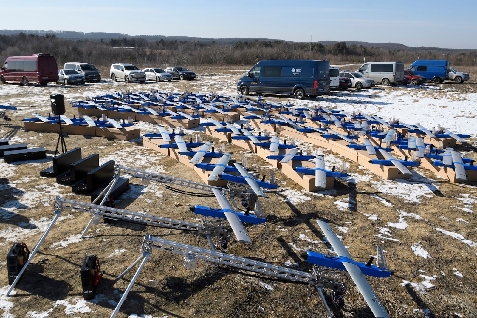 Ukrainian-made fixed-wing Besomar 3210 drone interceptors are handed over to the Armed Forces by Kozytskyi Charity Foundation in an undisclosed location in the Lviv region, western Ukraine, Friday, Feb. 21, 2025. (AP Photo/Mykola Tys)