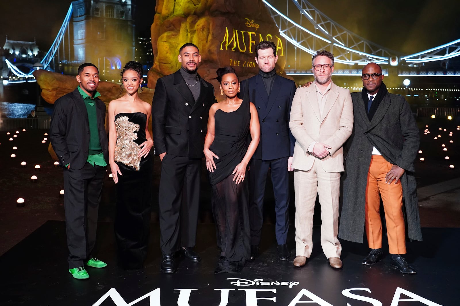 From left to right Kelvin Harrison Jr., Tiffany Boone, Aaron Pierre, Anika Noni Rose, Billy Eichner, Seth Rogan and Barry Jenkins attend a photo call for Mufasa: The Lion King at Potters Field, in London, Wednesday, Dec. 11, 2024. (Ian West/PA via AP)