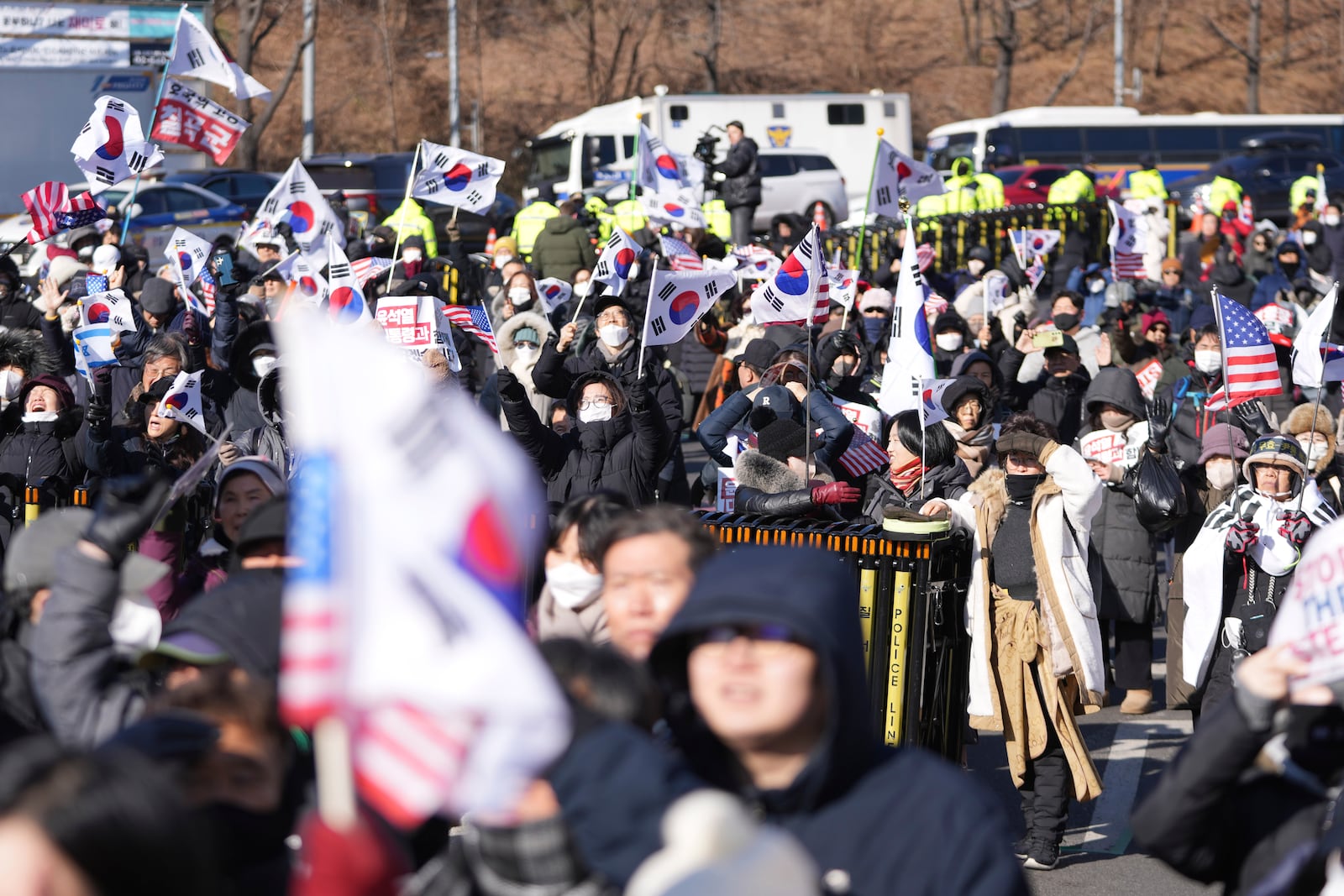 Supporters of impeached South Korean President Yoon Suk Yeol stage a rally to oppose his impeachment near the presidential residence in Seoul, South Korea, Wednesday, Jan. 15, 2025. (AP Photo/Lee Jin-man)