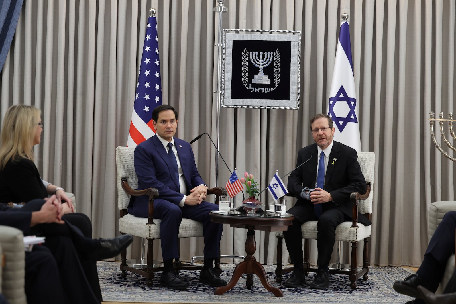 U.S. Secretary of State Marco Rubio, centre left, meets with Israeli President Isaac Herzog in Jerusalem, Israel, Sunday Feb. 16, 2025. (Abir Sultan/Pool Photo via AP)