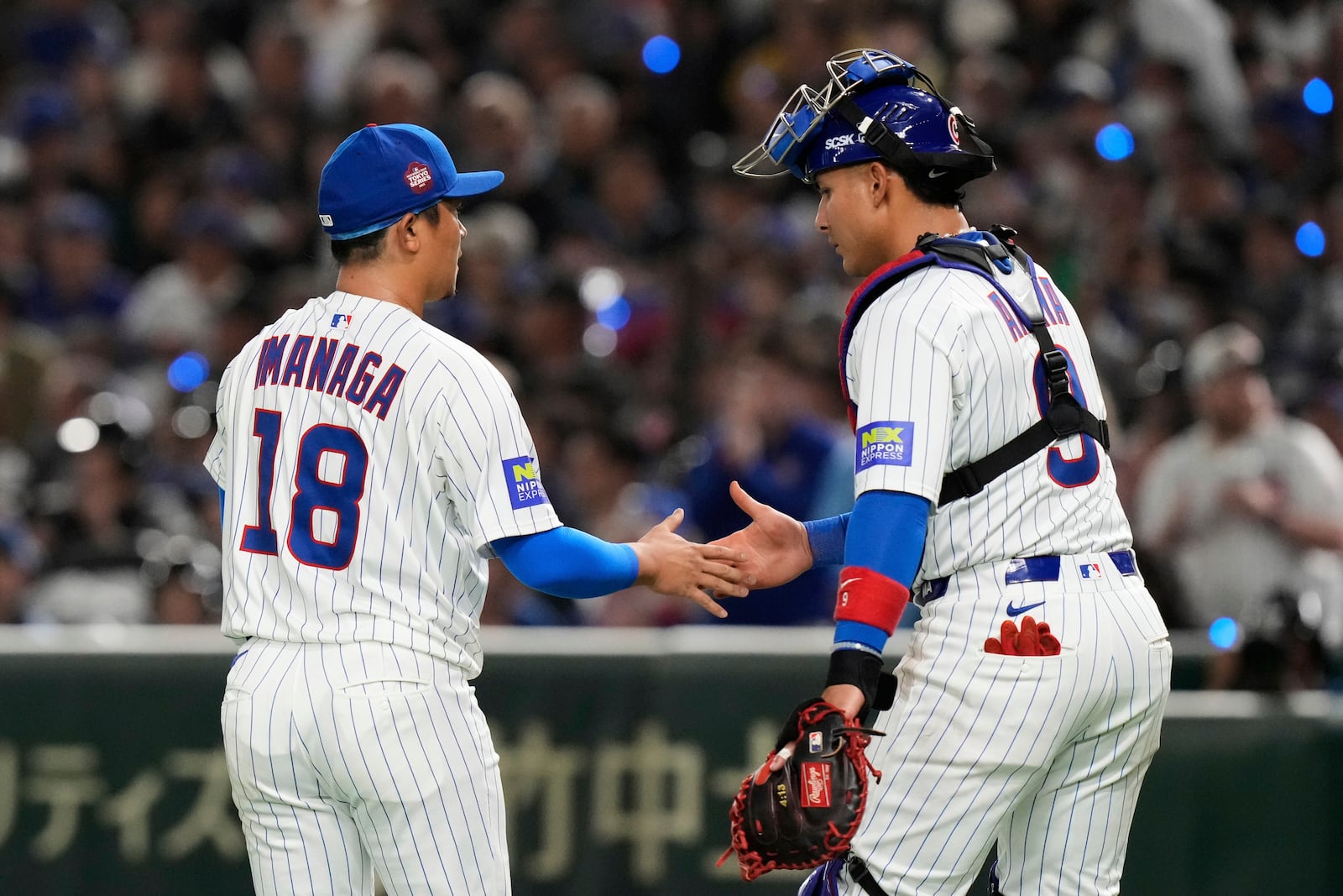 Chicago Cubs' Shota Imanaga, left, and Miguel Amaya, right, walk off the field after working against Los Angeles Dodgers in the second inning of an MLB Japan Series baseball game in Tokyo, Japan, Tuesday, March 18, 2025. (AP Photo/Eugene Hoshiko)